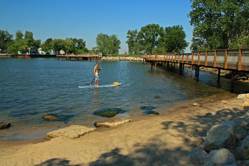 standup paddle boarding along the holland boardwalk